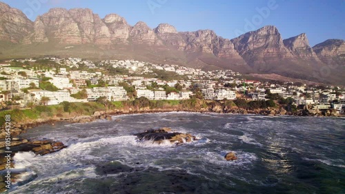 Camps Bay Beach in Cape Town, Western Cape, South Africa. Aerial shot Seaside city.