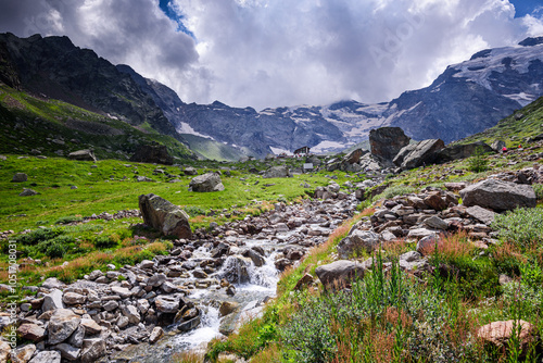 Mountain creek, rocks and meadows, Monte Rosa, Dufourspitze, Italian Alps, Italy, Europe photo