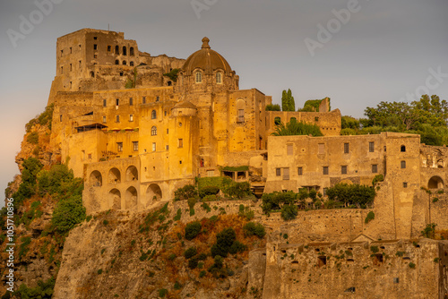 View of Aragonese Castle at sunset, Port of Ischia, Island of Ischia, Campania, Italy, Europe photo