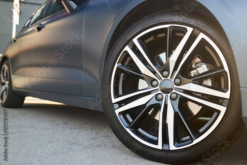 Принти на полотні Car detail shot. Wheel rim tire selective focus close up.