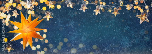 Obraz na płótnie Christmas tree with Christmas balls on the background of the night sky - decorations on fir branches with shiny and unfocused lights and snowflakes on an abstract background w salonie