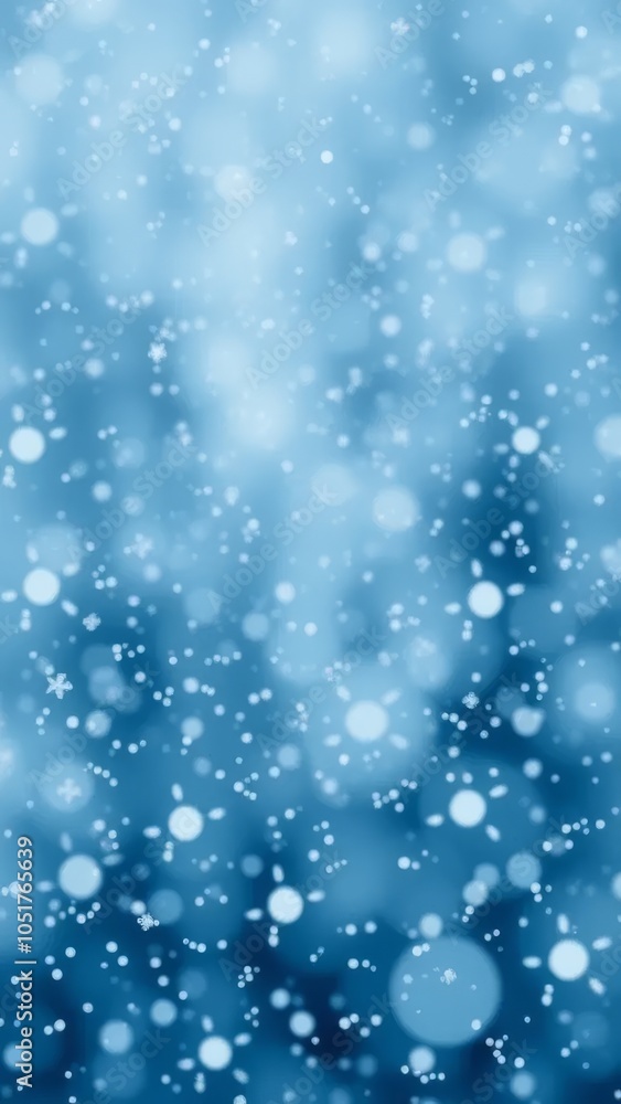 Fototapeta premium Abstract winter background with falling snowflakes and a soft blue glow