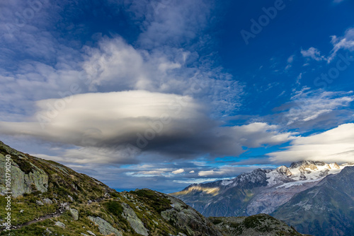 Chamonix rocky granite mountain peaks in french Alps around Mont Blanc summit in Chamonix valley. Scenic landscape of iconic alpine summits the legends of mountaineering and alpinism