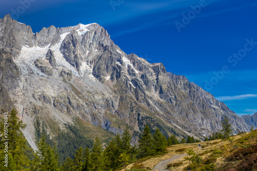 Chamonix rocky granite mountain peaks in french Alps around Mont Blanc summit in Chamonix valley. Scenic landscape of iconic alpine summits the legends of mountaineering and alpinism