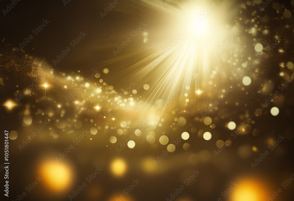 Obraz premium A bright light shines from above, illuminating a dark background with glowing particles and a hazy, golden glow.
