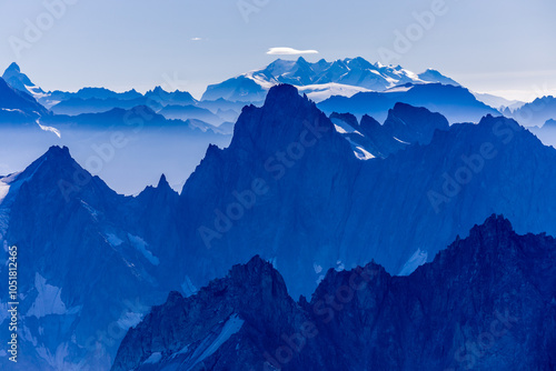 Chamonix rocky granite mountain peaks in french Alps around Mont Blanc summit in Chamonix valley. Scenic landscape of iconic alpine summits the legends of mountaineering and alpinism