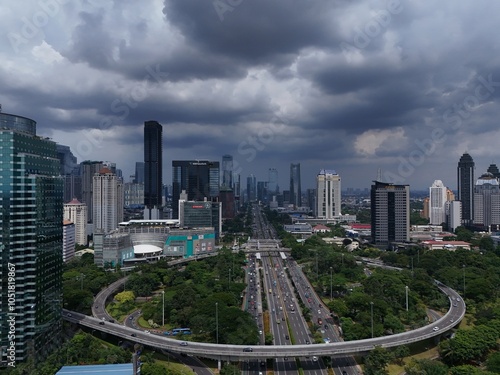 Jakarta City during claudy day photo