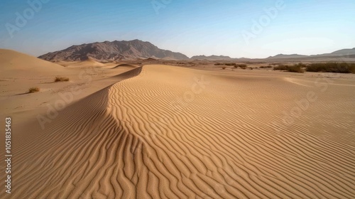 Desert Dunes Under Blue Sky