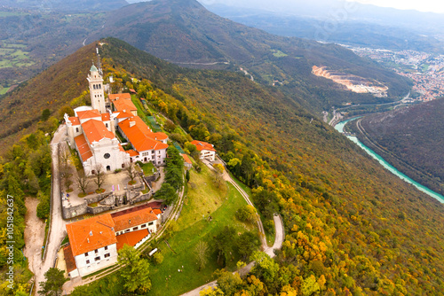 Aerial view of the Basilica of the Assumption of Mary on the Holy Mountain (Sveta Gora) and the Soca river Canyon in Slovenia at autumn time  photo