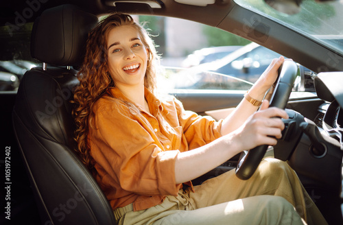 Happy woman driving a car. Car travel, lifestyle concept.