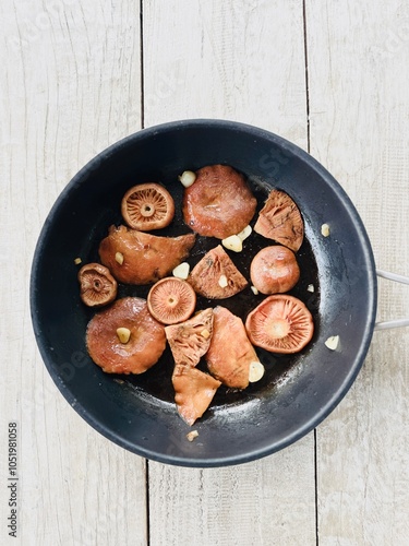 Cooked edible orange mushrooms.  Lactarius deliciosus.
 photo