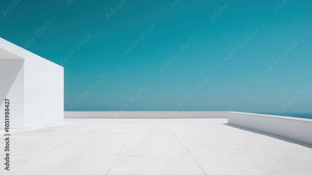 A serene, minimalist terrace with a white architectural structure overlooks a tranquil sea under a clear blue sky. A serene, minimalist terrace with a white architectural structure overlooks a tranquil sea under a clear blue sky.