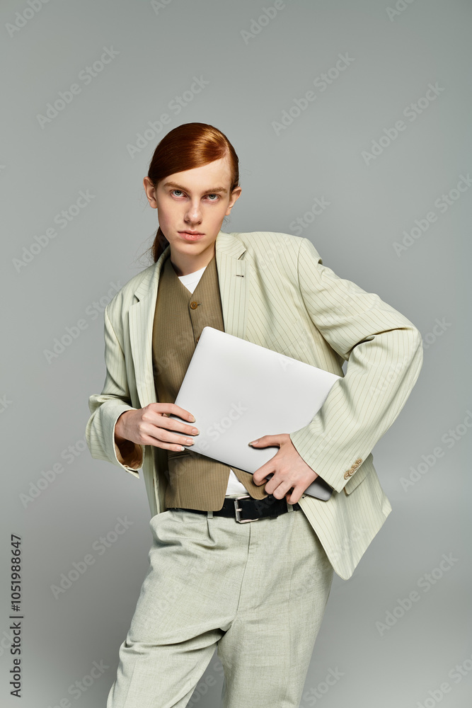 A stylish teenage boy with red hair poses confidently in an elegant outfit, showcasing a modern aesthetic. A stylish teenage boy with red hair poses confidently in an elegant outfit, showcasing a modern aesthetic.