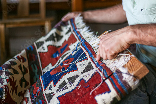 Carpet repairer in Turkey photo