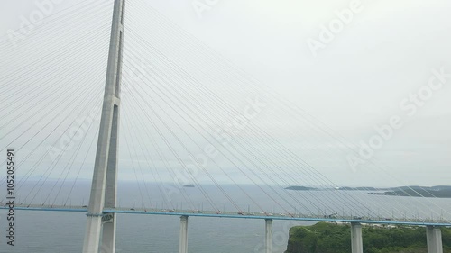 Russian bridge in the city of Vladivostok. Aerial view -  2024 Vladivostok, Russia. sunny weather Primorsky Krai. Editorial use