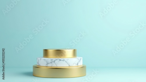 A minimalist composition featuring stacked circular surfaces in marble and gold against a soft turquoise background.
