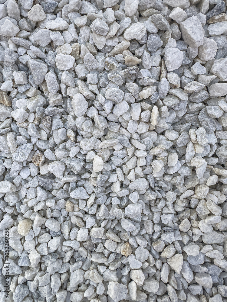 Background of natural gray small pebbles or stone in a garden paths and flower beds. Background of natural gray small pebbles or stone in a garden paths and flower beds.