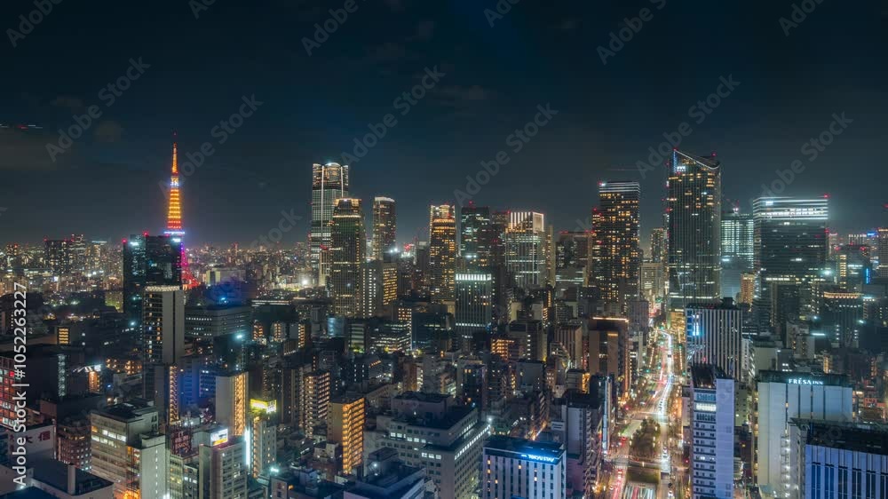 Dusk to night timelapse view of Tokyo cityscape in the Minato District of central Tokyo, Japan. Dusk to night timelapse view of Tokyo cityscape in the Minato District of central Tokyo, Japan.