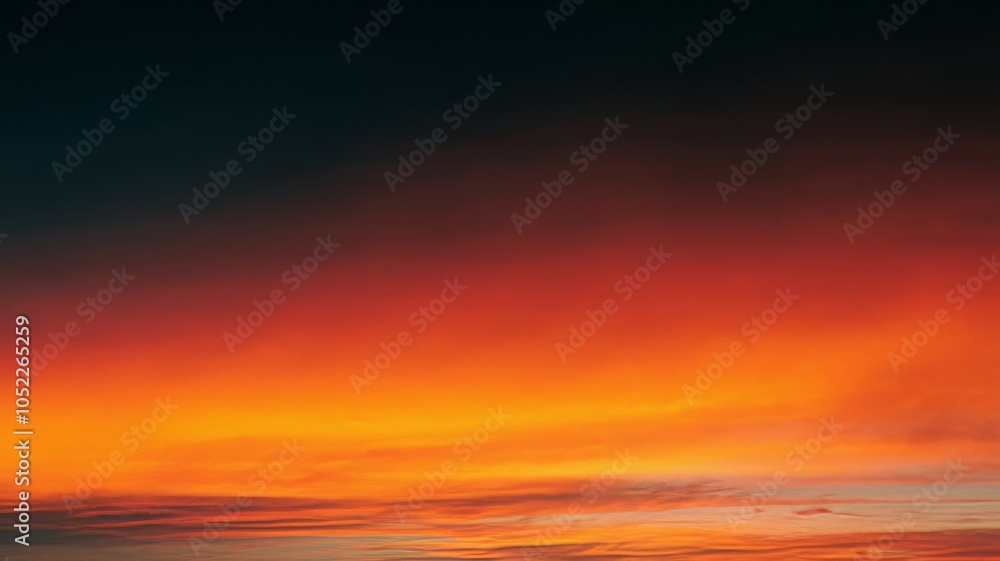 Obraz premium Fiery sunset sky. Burning horizon, vibrant colors paint the evening sky. A breathtaking scene of hope and renewal.