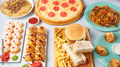 Different dishes - pizza, burger, manti, lagman, doner, sushi. Top view on a light background