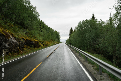 Empty road in a moody norway mountain landscape