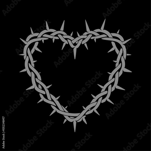 Branch with thorns in the shape of a heart. Black background.