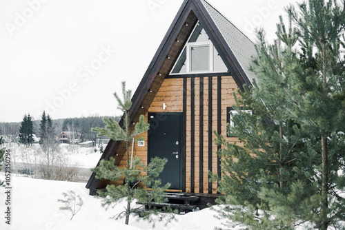 A country house in nature in winter. Rest in an ecologically clean place in winter. Glamping in nature.