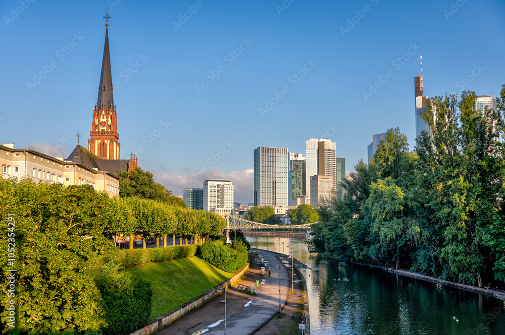 Fototapeta premium Frankfurt, Germany - July 29, 2024: The city skyline of Frankfurt in the early morning
