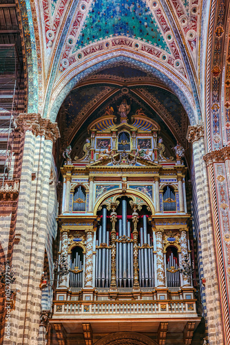 The majestic organ in the Cathedral of Duomo di Orvieto, showcasing intricate design and historical significance in Orvieto, Umbria, Italy