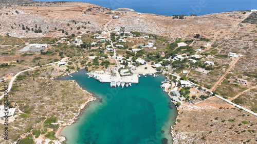 Aerial drone photo of paradise island with crystal clear turquoise beaches and main seaside town of Arki or Arkoi, Dodecanese, Greece photo