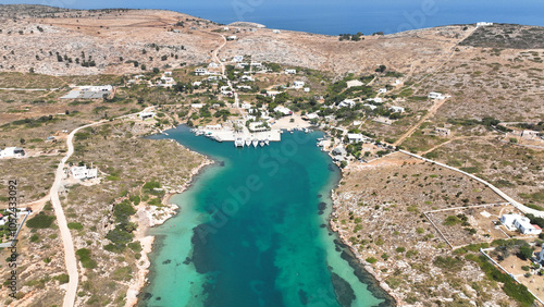 Aerial drone photo of paradise island with crystal clear turquoise beaches and main seaside town of Arki or Arkoi, Dodecanese, Greece photo