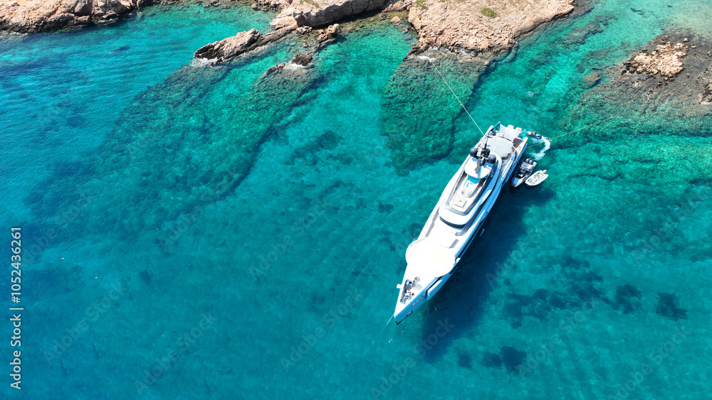 Aerial drone photo of paradise blue lagoon and sandy beaches of Tiganakia bay forming a complex of small islets in island of Arkoi or Arki, Dodecanese, Greece