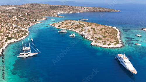 Aerial drone photo of paradise blue lagoon and sandy beaches of Tiganakia bay forming a complex of small islets in island of Arkoi or Arki, Dodecanese, Greece photo