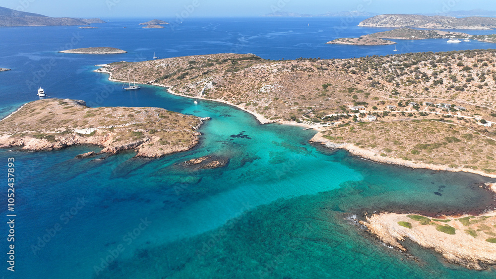 Aerial drone photo of paradise blue lagoon and sandy beaches of Tiganakia bay forming a complex of small islets in island of Arkoi or Arki, Dodecanese, Greece