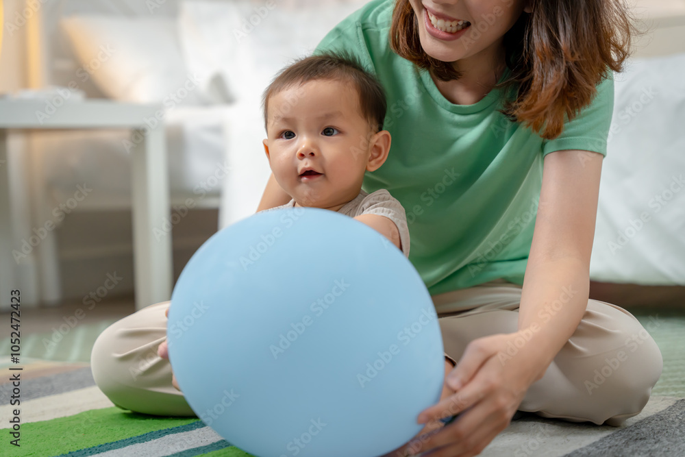 Asian baby and woman doing lifestyle activities together at home. Asian baby and woman doing lifestyle activities together at home.