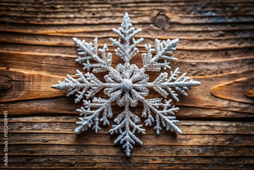 Stunning Drone Photography of a Beautiful Snowflake on Rustic Wooden Background - Top View Capture for Winter