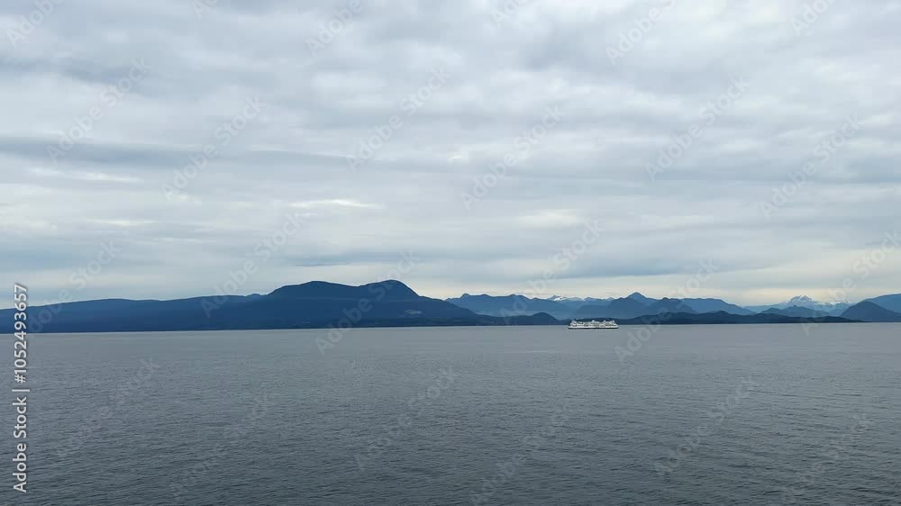 View of the ocean and a ferry travelling through Georgia Strait from Nanaimo to Vancouver View of the ocean and a ferry travelling through Georgia Strait from Nanaimo to Vancouver