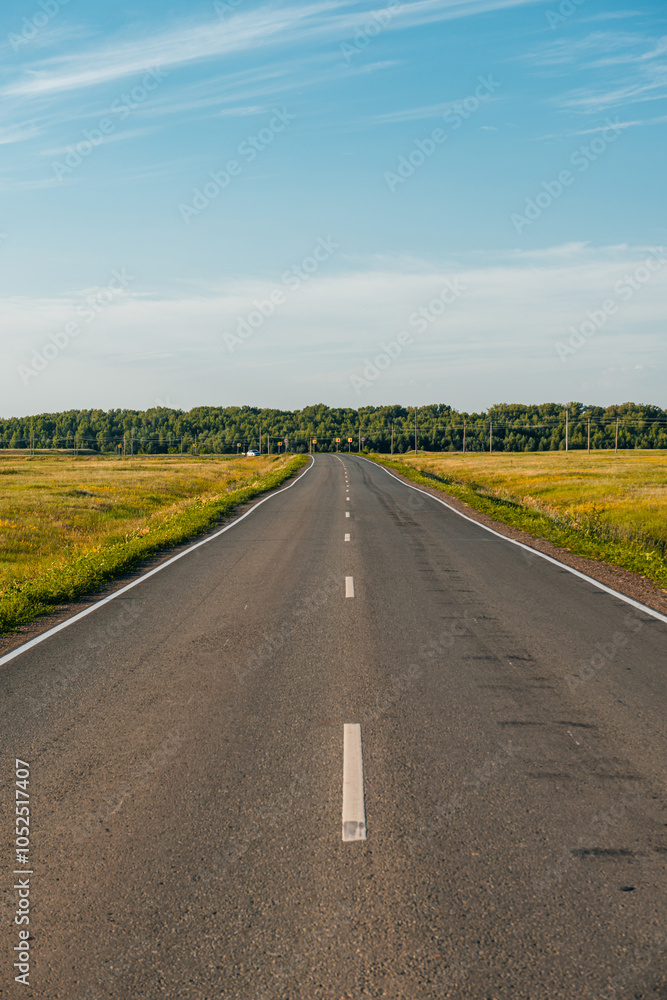 an empty road at sunset in the Orenburg region an empty road at sunset in the Orenburg region