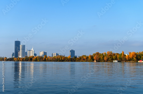 Skyline of Vienna and blue Donau river, autumn season