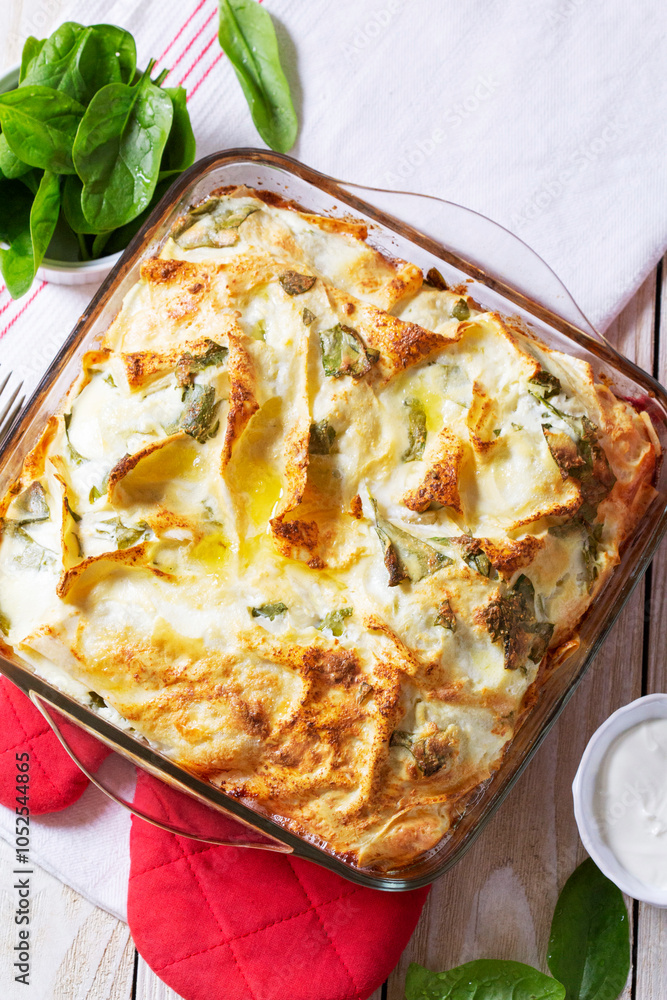 Traditional Bulgarian or Balkan pie banitsa made from filo dough, cream cheese and spinach.