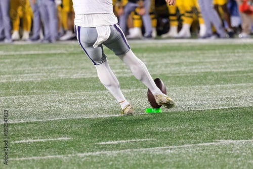 Close-up of a College football kicker on the football field