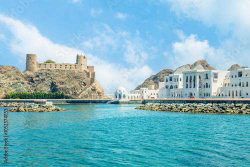 Fotografie View to the arabian Al Jalali castle standing on the rocks and white royal palac