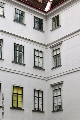 Minimalist Corner of Historic European Building with Symmetrical Windows – For Architectural Design and Urban Development Projects. Vienna, Austria