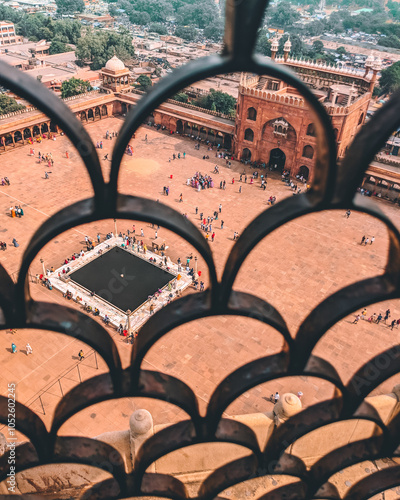 Aerial shot of mosque through metal frame photo