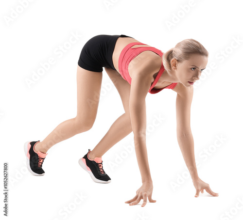 Runner in starting position on white background