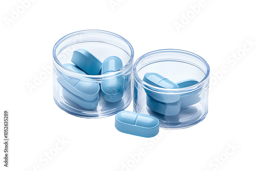 Two transparent containers holding blue capsules, perfect for medical, health, or pharmaceutical themes. photo