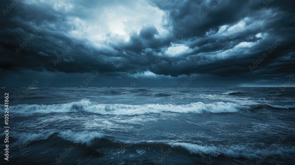 Stormy seascape with dark brooding clouds during twilight hours Stormy seascape with dark brooding clouds during twilight hours