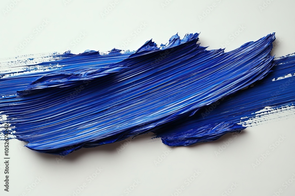 Large horizontal stroke of cobalt blue, made with oil paints on white canvas. Textured surface and rich color create a sense of depth and volume. Large horizontal stroke of cobalt blue, made with oil paints on white canvas. Textured surface and rich color create a sense of depth and volume.