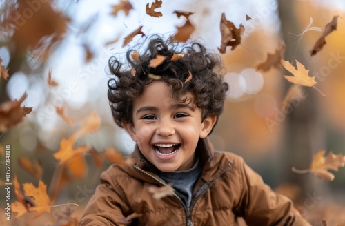 Boy Laughing in Autumn Forest