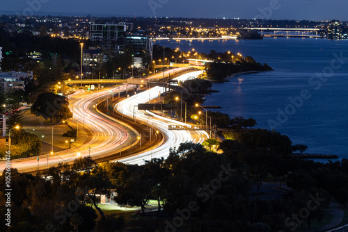 Slika na platnu Light trails on a busy road at night in rush hour